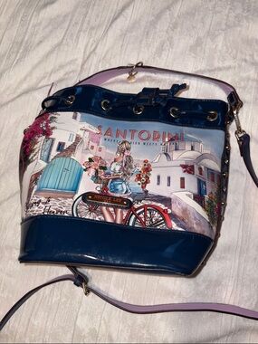 Nicole Lee Navy Santorini Bucket Crossbody with Pastel Accents